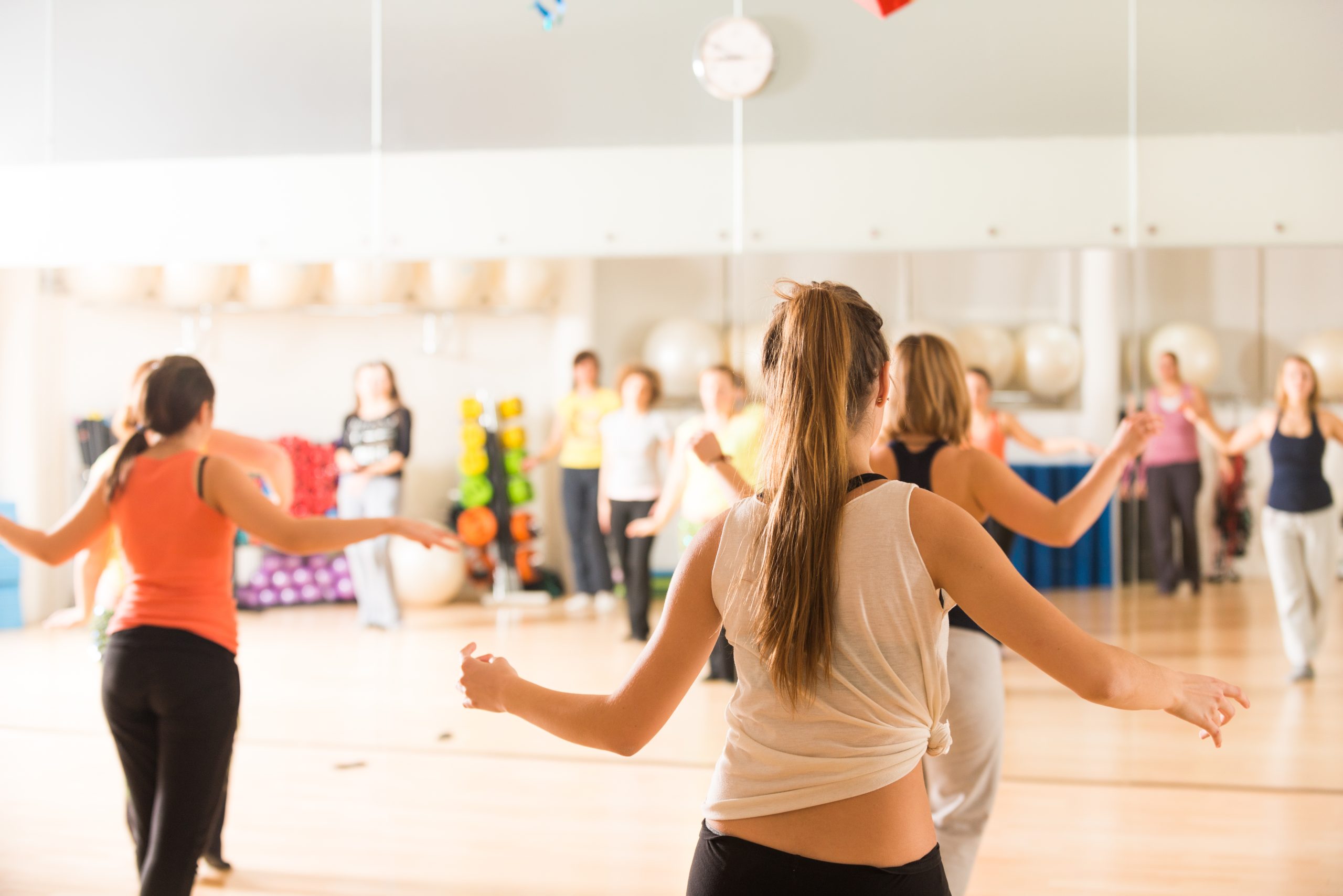 Dance teacher running a dance class